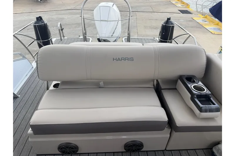 Slide: The Image of Luxury seating on 2022 Harris FloteBote Solstice 250 pontoon boat with cup holders. - 16