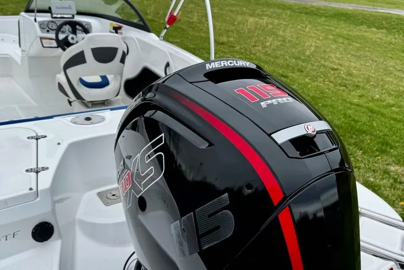 Slide: The Image of 2020 Tahoe 450 TF boat with Mercury 115 Pro XS engine, white interior. - 7