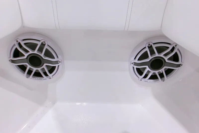 Slide: The Image of 2026 Contender 32 ST boat speakers, white interior, marine audio system. - 11