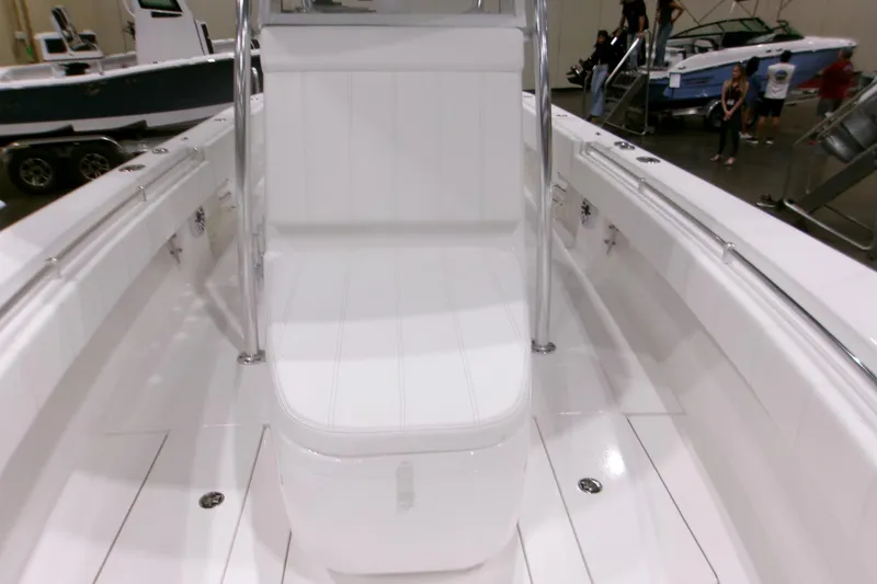 Slide: The Image of 2026 Contender 32 ST boat interior with sleek white seating and modern design. - 13