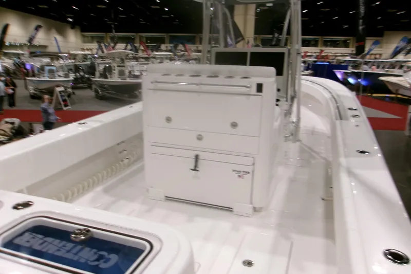 Slide: The Image of 2026 Contender 32 ST boat interior at a boat show, showcasing sleek design and features. - 23