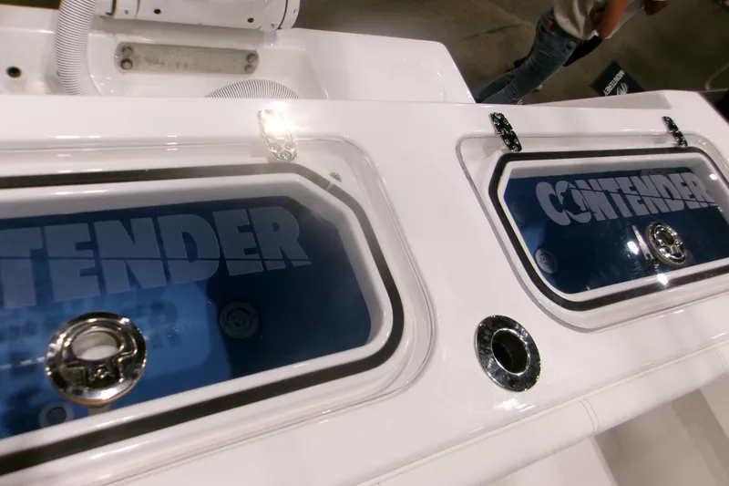 Slide: The Image of 2026 Contender 32 ST boat livewell lids with logo, showcasing sleek design. - 3