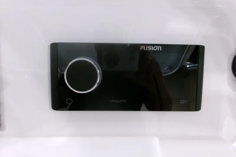 Slide: The Image of Fusion audio system on 2026 Contender 32 ST boat dashboard. - 9
