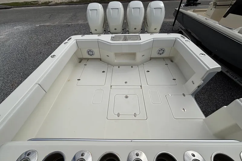 Slide: The Image of 2018 SeaVee 390Z boat deck with four powerful outboard engines. - 11