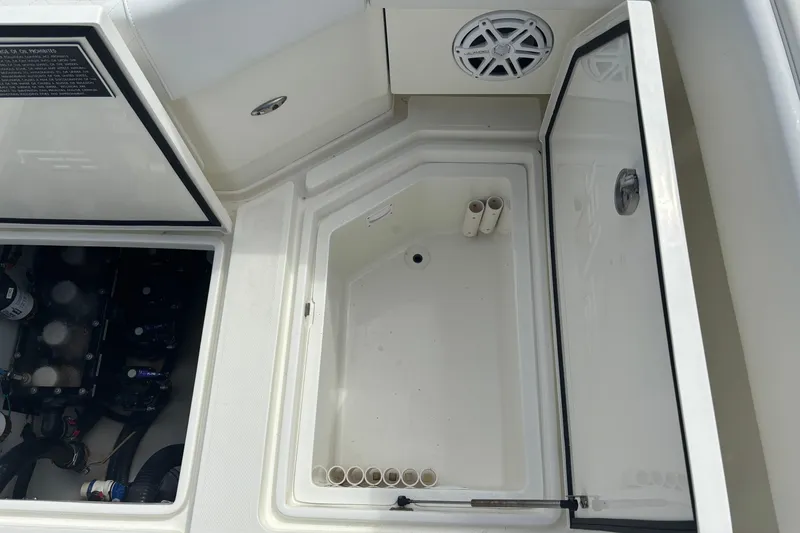 Slide: The Image of 2018 SeaVee 390Z boat storage compartments and speaker detail. - 15