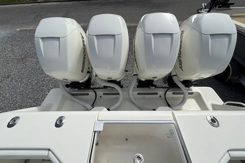 Slide: The Image of 2018 SeaVee 390Z boat with four Mercury outboard engines, rear view. - 19