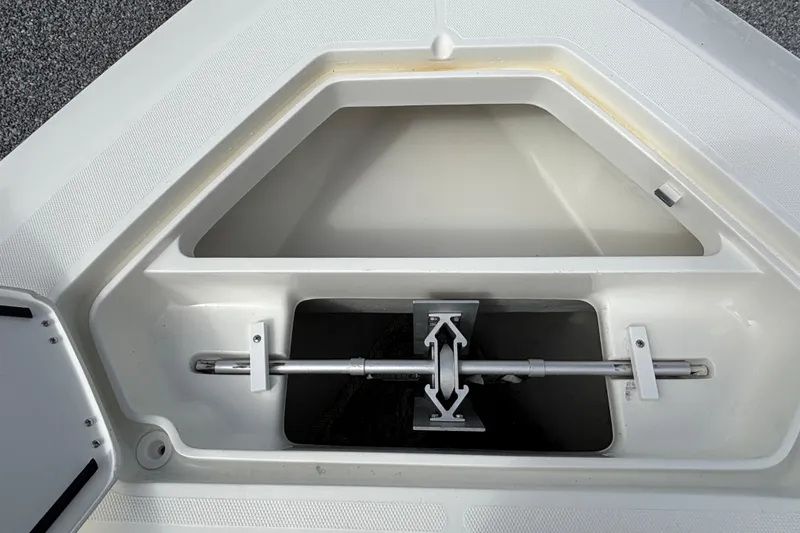 Slide: The Image of Anchor locker of a 2018 SeaVee 390Z boat, showcasing storage compartment and hardware. - 29
