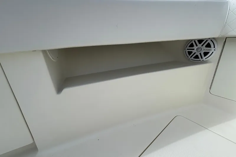 Slide: The Image of 2018 SeaVee 390Z boat interior with speaker and storage compartment. - 31