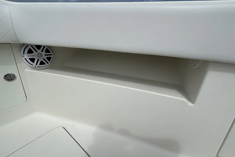 Slide: The Image of 2018 SeaVee 390Z boat interior detail with speaker and storage compartment. - 32