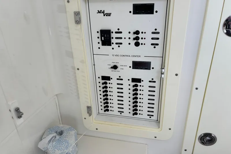 Slide: The Image of Control panel of a 2018 SeaVee 390Z boat, featuring 12V DC system. - 36