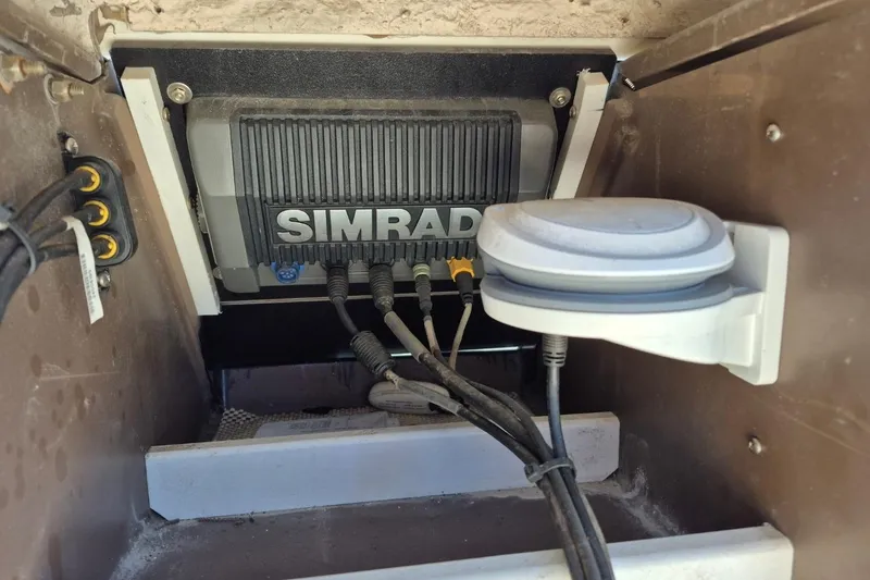 Slide: The Image of Simrad marine electronics installed in 1987 Mako 261 Center Console boat. - 38