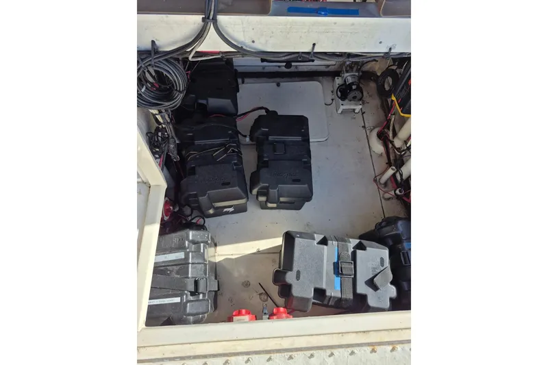 Slide: The Image of Interior view of a 1987 Mako 261 Center Console boat's battery compartment. - 39