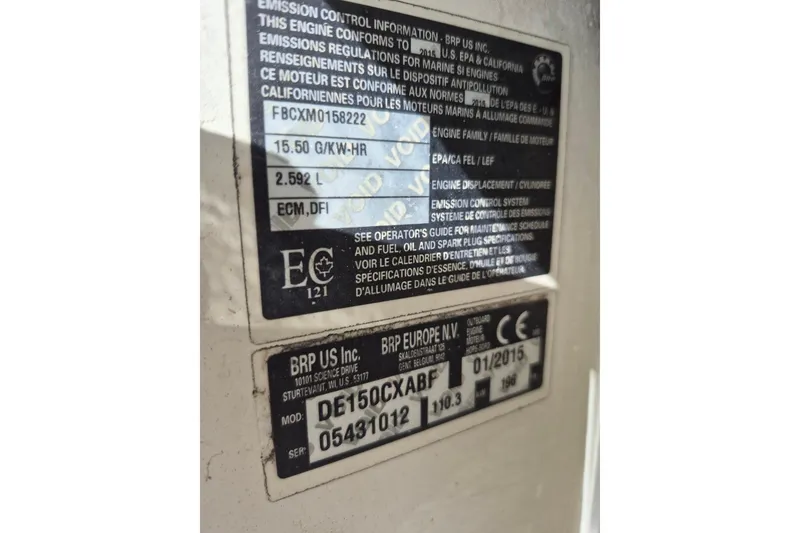 Slide: The Image of Emission control label on a 1987 Mako 261 Center Console boat engine. - 6