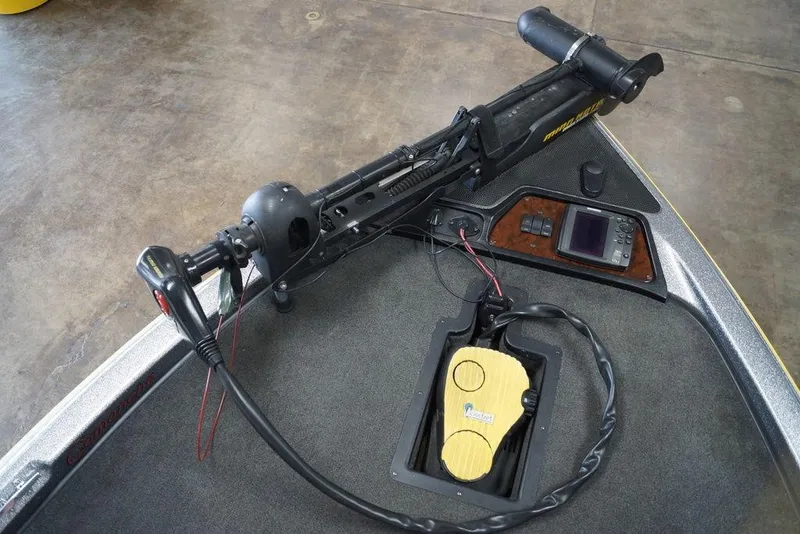 Slide: The Image of 2006 Ranger 521 VX boat with trolling motor and electronic controls on deck. - 11