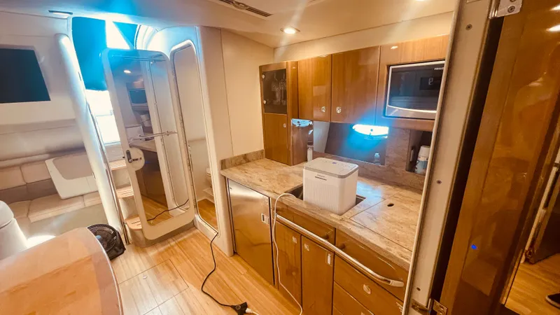 Slide: The Image of Interior of 2016 Formula 37 Performance Cruiser with modern kitchen. - 40