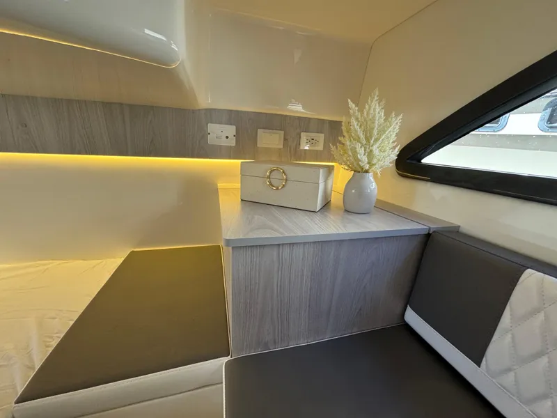 Slide: The Image of Modern interior of 2025 Hanover 387 with sleek design, ambient lighting, and decorative elements. - 11