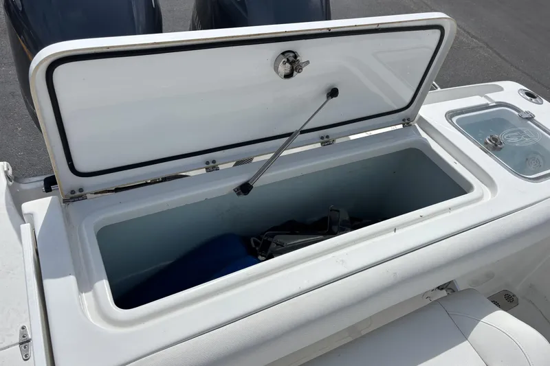 Slide: The Image of Open storage compartment on 2018 Sea Hunt Gamefish 27 boat. - 13
