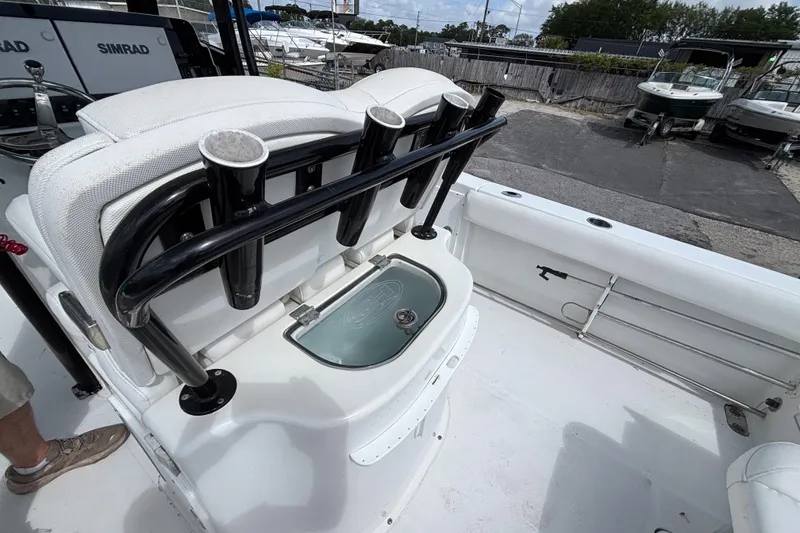 Slide: The Image of 2018 Sea Hunt Gamefish 27 boat with rod holders and seating. - 17