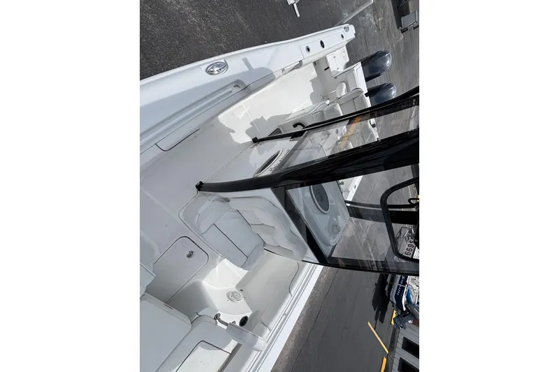 Slide: The Image of 2018 Sea Hunt Gamefish 27 boat with forward seating, docked and ready for use. - 38