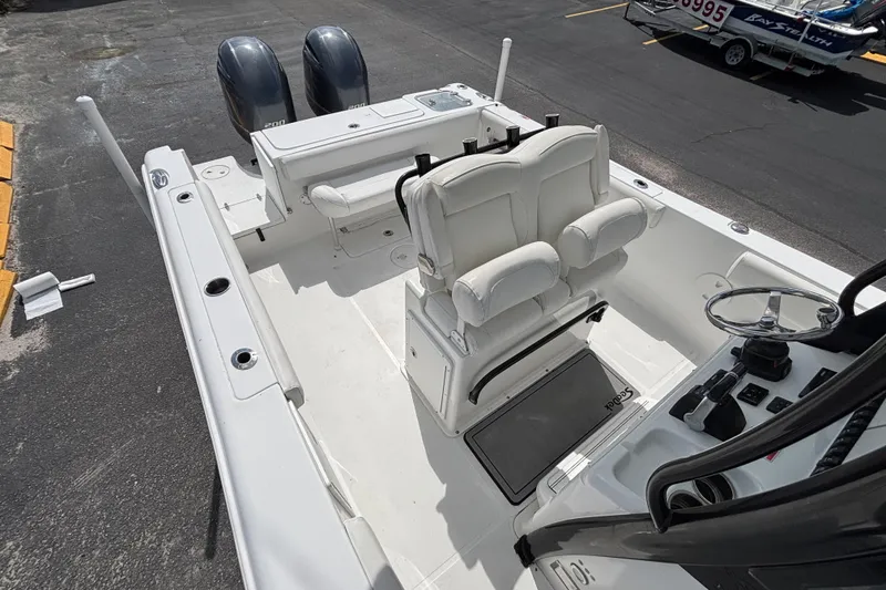 Slide: The Image of 2018 Sea Hunt Gamefish 27 boat interior with dual engines and forward seating. - 40