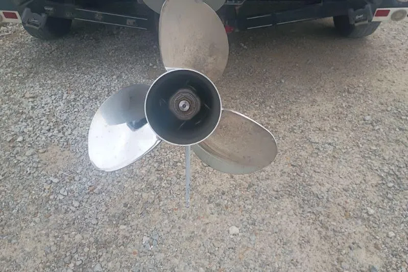 Slide: The Image of 2010 Ranger Z520 boat propeller on gravel surface. - 7