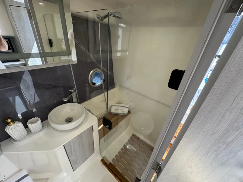 Slide: The Image of Modern bathroom in 2025 Hanover 387, featuring sleek design and glass shower enclosure. - 8