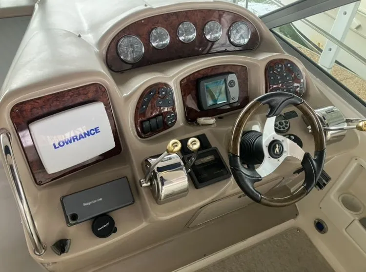 Slide: The Image of Sea Ray Sundancer 320 helm with navigation system, 2004 model. - 14