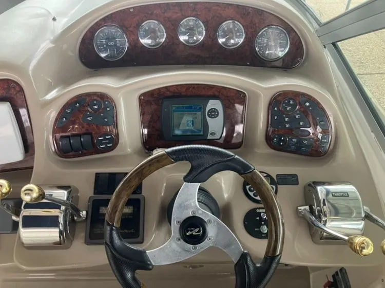 Slide: The Image of Dashboard of a 2004 Sea Ray Sundancer 320 boat. - 15