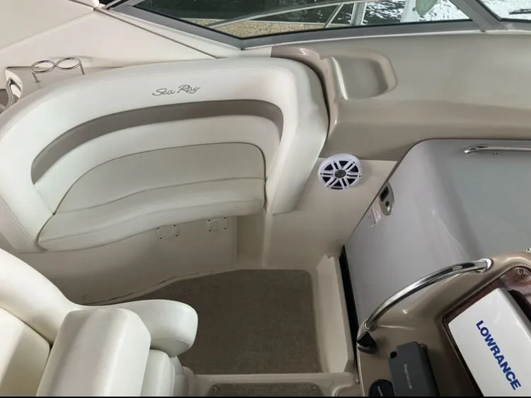 Slide: The Image of Interior of a 2004 Sea Ray Sundancer 320 boat with helm console. - 16