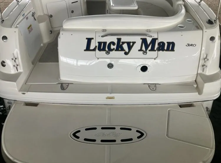 Slide: The Image of Rear view of Sea Ray Sundancer 320 yacht, year 2004. - 7