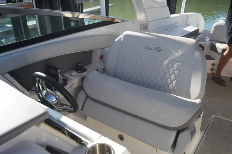 Slide: The Image of Luxury helm seat on 2023 Sea Ray SLX 350 boat, featuring elegant design and premium materials. - 15