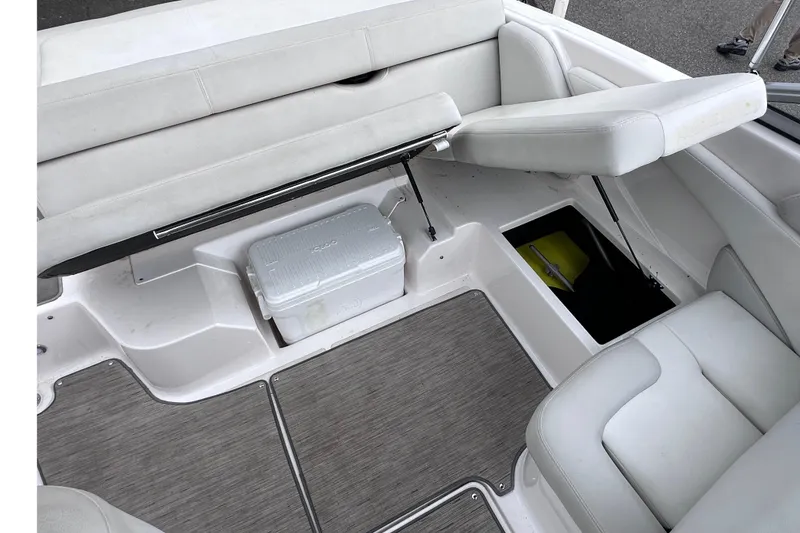Slide: The Image of 2018 Regal 1900 ES Bowrider interior with storage compartments and seating. - 11