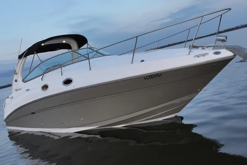 Slide: The Image of 2007 Sea Ray Sundancer 280 cruising on calm waters at sunset. - 10