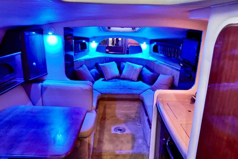 Slide: The Image of Luxurious interior of 2007 Sea Ray Sundancer 280 with cozy seating and ambient lighting. - 11
