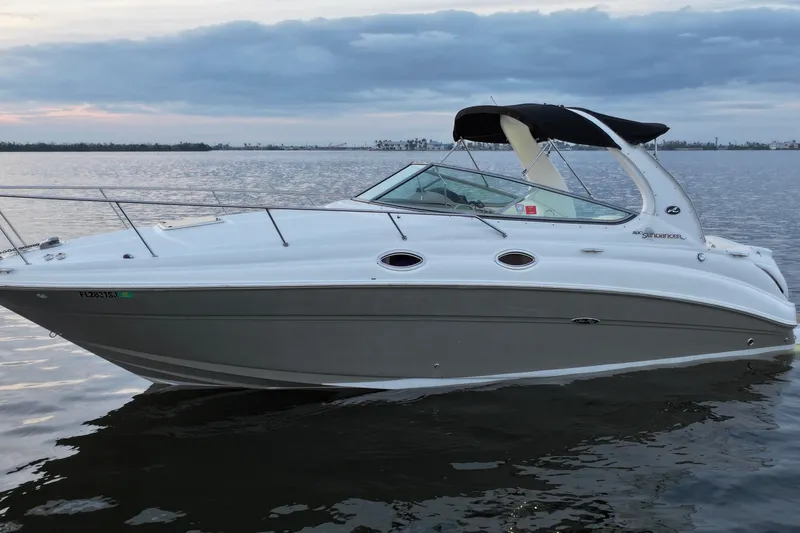 Slide: The Image of 2007 Sea Ray Sundancer 280 boat on calm water at sunset. - 4