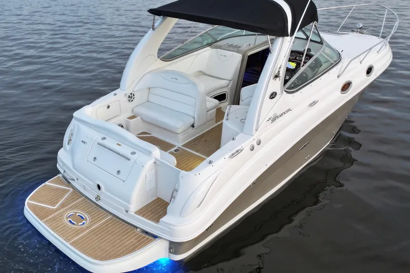 Slide: The Image of 2007 Sea Ray Sundancer 280 boat with sleek design on calm water. - 5