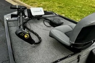 Slide: The Image of 2024 Tracker Bass Tracker Classic XL boat with Garmin equipment on deck. - 3