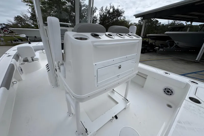 Slide: The Image of 2026 Caymas 26 HB boat interior with seating and storage compartments. - 35