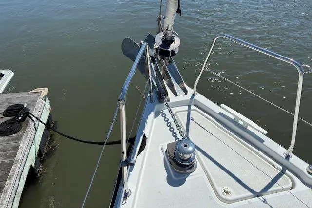 Slide: The Image of Bow of 2017 Beneteau Oceanis 41.1 sailboat docked at marina. - 12