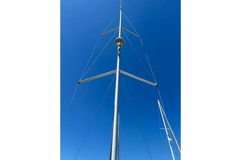 Slide: The Image of Mast of 2017 Beneteau Oceanis 41.1 sailboat against clear blue sky. - 14
