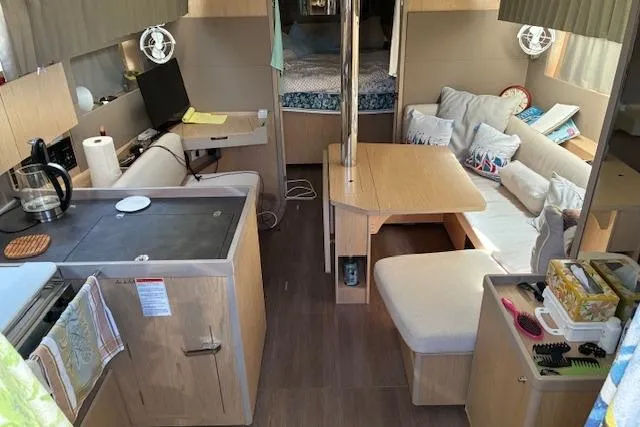 Slide: The Image of Interior of 2017 Beneteau Oceanis 41.1 yacht with cozy seating and modern amenities. - 22