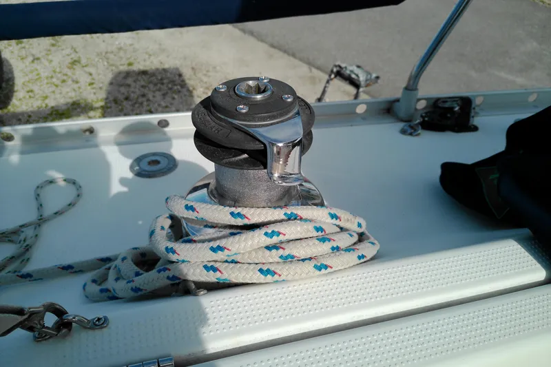 Slide: The Image of Winch and rope on 1993 Beneteau First 310 sailboat deck. - 17