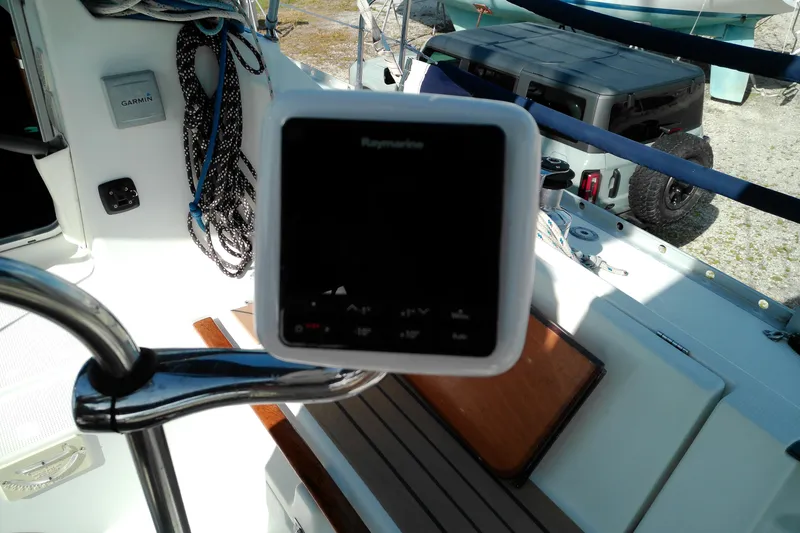 Slide: The Image of Cockpit of 1993 Beneteau First 310 sailboat with Raymarine navigation equipment. - 23