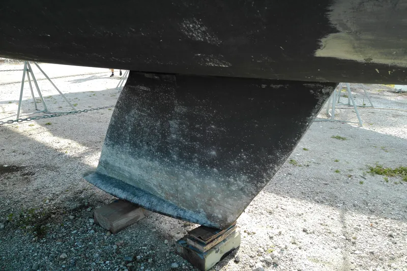 Slide: The Image of Keel of a 1993 Beneteau First 310 sailboat on dry dock. - 6