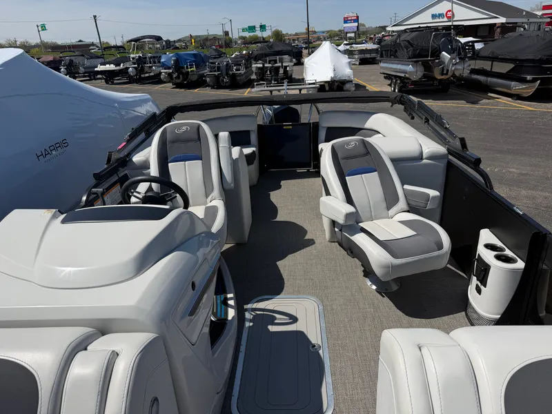 Slide: The Image of Interior of 2022 Barletta CORSA 22 QC TRITOON with luxurious seating. - 16
