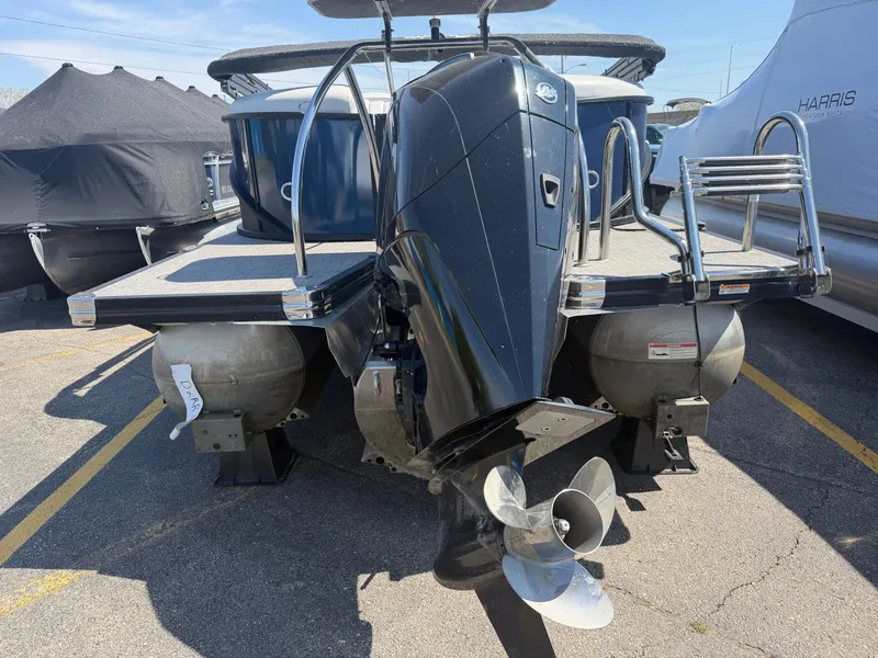 Slide: The Image of 2022 Barletta CORSA 22 QC TRITOON with outboard motor. - 5