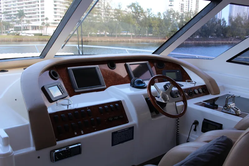 Slide: The Image of Helm of 2006 Neptunus 55 Cabrio yacht with modern navigation equipment. - 12