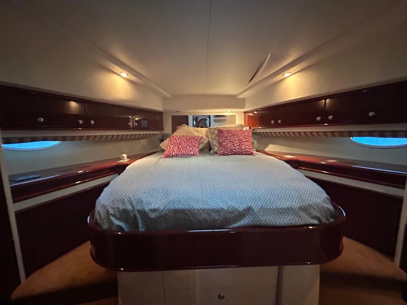 Slide: The Image of Luxurious cabin interior of 2006 Neptunus 55 Cabrio yacht with cozy bedding. - 21