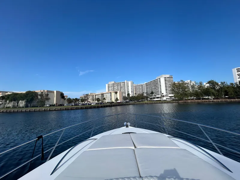 Slide: The Image of Bow view from 2006 Neptunus 55 Cabrio yacht, city skyline in background. - 34