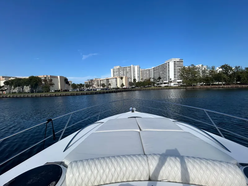 Slide: The Image of Bow view from 2006 Neptunus 55 Cabrio yacht, city skyline in background. - 35